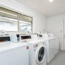laundry room at Polaris at East Point apartments located in Atlanta, GA